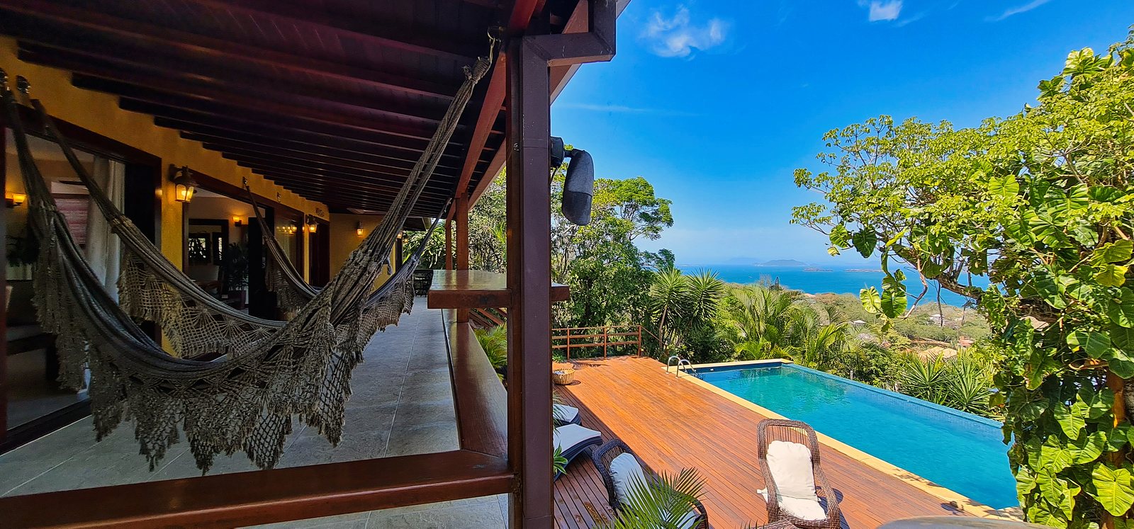 The hammock lounge beside the pool, looking out to the sea